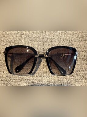 Miu Miu Black Sunglasses with Gold Bridge
